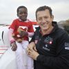 Exclusif - Dany Boon, parrain de l'Ecurie du Coeur (équipe MD Rallye Sport) qui prendra le départ du rallye Dakar 2015 au profit de l'association Mécénat Chirurgie Cardiaque, lors de la présentation de la voiture avec l'équipe à Saint-Denis, le 19 novembre 2014.