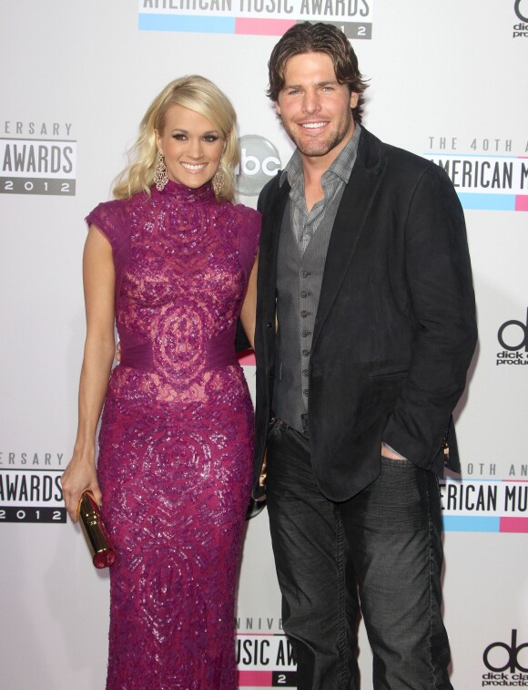 Carrie Underwood et son mari Mike Fisher lors de la cérémonie annuelle des 40e "American Music Awards" à Los Angeles, le 18 novembre 2012.