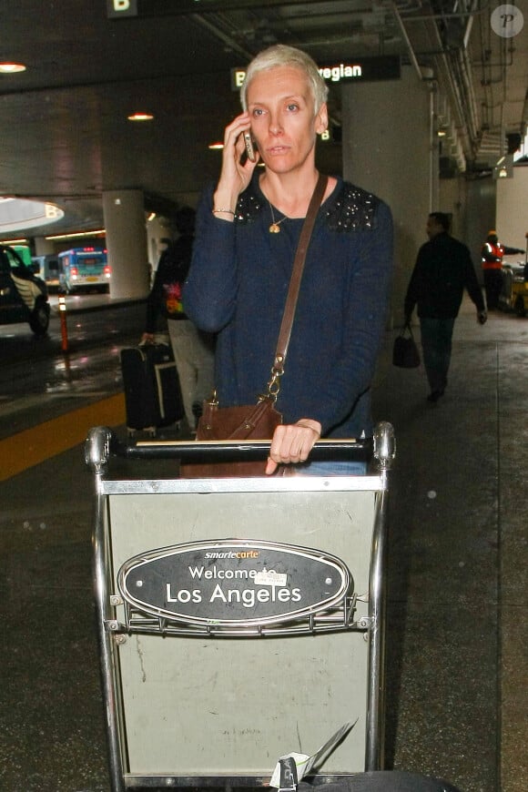 Toni Collette arrive au LAX, Los Angeles, le 3 décembre 2014.