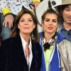 La princesse Caroline de Hanovre et Charlotte Casiraghi lors de l’épreuve Style & Sport Competition for AMADE au troisième jour du Gucci Paris Masters à Villepinte le 6 décembre 2014