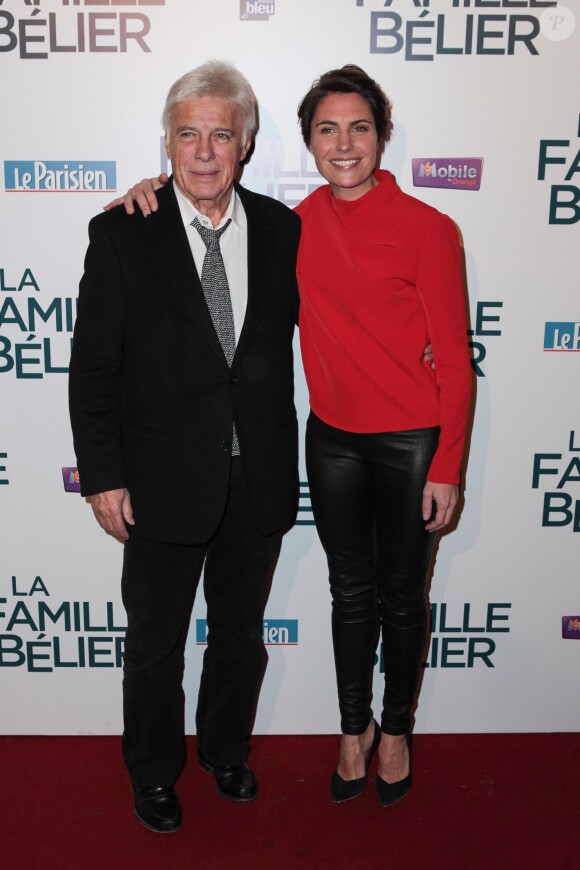 Guy Bedos et  Alessandra Sublet lors de l'avant première du film La Famille Bélier au cinéma le Grand Rex à Paris le 9 décembre 2014.