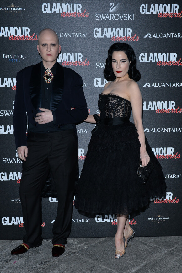Ali Mahdavi et Dita Von Teese assistent à la première édition des Glamour Awards organisés par Glamour Italia. Milan, le 11 décembre 2014.