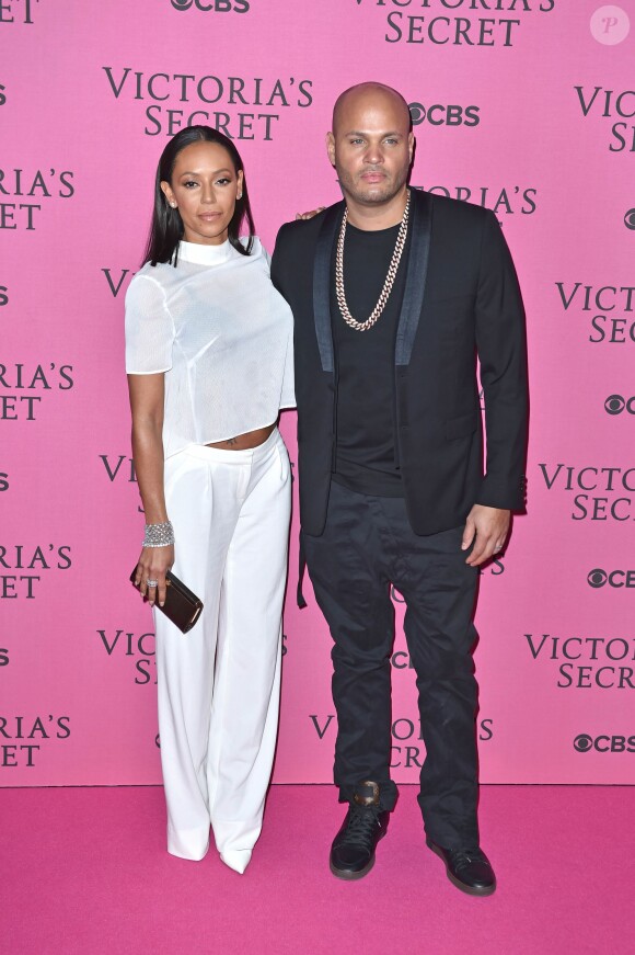 Melanie Brown (Mel B) et son mari Stephan Belafonte au défilé Victoria's Secret à Londres, le 2 décembre 2014. 