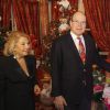 Le prince Albert II de Monaco et Louisette Levy Soussan Azzoaglio lors de la 10ème vente aux enchères des sapins de l'association Action Innocence Monaco dans les salons de l'hôtel Hermitage à Monaco, le 16 décembre 2014