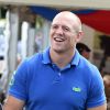 Mike Tindall avec sa fille Mia en poussette lors du 3e jour du Festival of British Eventing à Gatcombe Park, le 3 août 2014