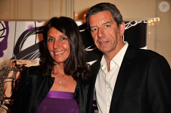 Michel Cymes et sa femme - Gala Enfance Majuscule au profit de l'enfance maltraitée à la salle Gaveau à Paris le 10 mars 2014.