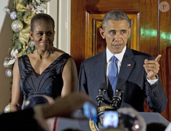 Barack Obama et son épouse à Washington, le 17 décembre 2014.