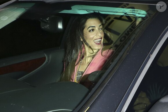 Amal Clooney, avec son époux George, se rendant au restaurant Asanebo Sushi à Los Angeles avec un couple d'amis le 17 décembre 2014