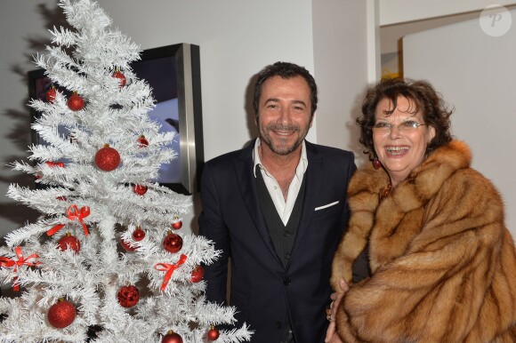 Bernard Montiel, Claudia Cardinale - Inauguration du Concept Store Leica à Paris, rue Faubourg Saint-Honoré le 18 décembre 2014