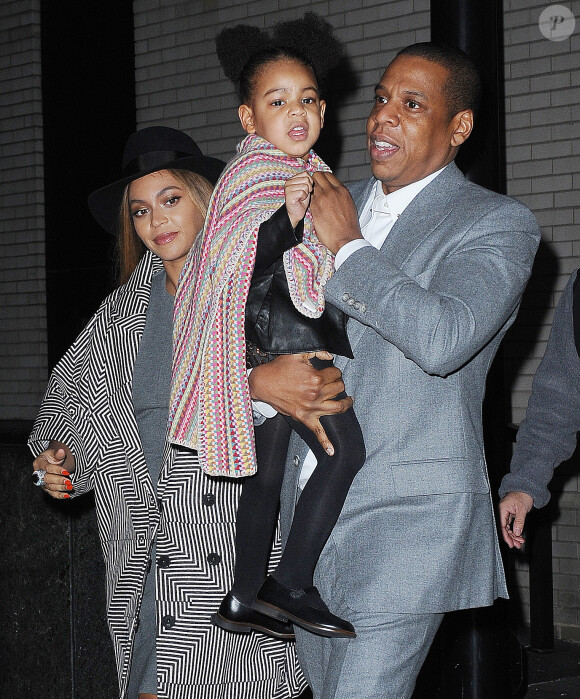 Beyoncé, Jay Z et leur fille Blue Ivy Carter à New York. Le 7 décembre 2014.