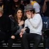Ian Somerhalder et sa petite-amie Nikki Reed assistent au match de basket des Lakers contre les Pheonix Suns à Los Angeles, le 28 décembre 2014. 