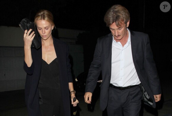 Charlize Theron et son compagnon Sean Penn lors d'une soirée au restaurant Craig à West Hollywood le 5 janvier 2015