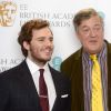 Sam Claflin et Stephen Fry lors des nominations aux BAFTA Film Awards à Londres le 9 janvier 2015.