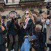 Natalia Vodianova arrive à l'Opéra Garnier pour assister au défilé Stella McCartney printemps-été 2014-2015. Paris, le 29 septembre 2014.