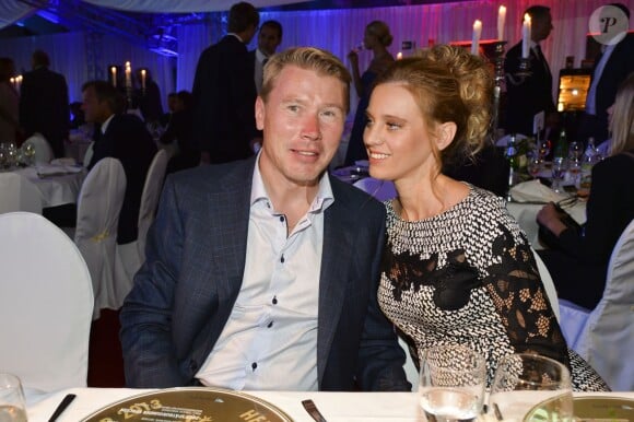 Mika Häkkinen et sa compagne Marketa Kromatova lors de la soirée de la Coupe des Présidents Hermès Eagle 2013 à Bad Griesbach le 14 septembre 2013