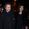 Luc Chatel et une amie, à la fête d'anniversaire organisée à l'occasion des 60 ans de Nicolas Sarkozy à son domicile à Paris, le 30 janvier 2015.