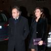 Luc Chatel et une amie, à la fête d'anniversaire organisée à l'occasion des 60 ans de Nicolas Sarkozy à son domicile à Paris, le 30 janvier 2015.