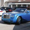 Exclusif - Johnny Hallyday emmène sa fille Jade déjeuner en Rolls-Royce décapotable bleue dans un restaurant à Pacific Palisades, le 31 janvier 2015.