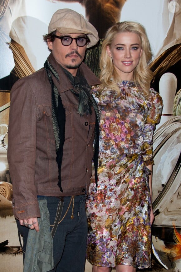 Johnny Depp et Amber Heard lors de l'avant-première du film Rhum Express à Paris le 8 novembre 2011