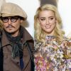 Johnny Depp et Amber Heard au photocall du film "Rhum Express" à Paris le 8 novembre 2011.