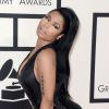 Nicki Minaj assiste aux 57e Grammy Awards au Staples Center, habillée d'une robe noire Tom Ford. Los Angeles, le 8 février 2015.