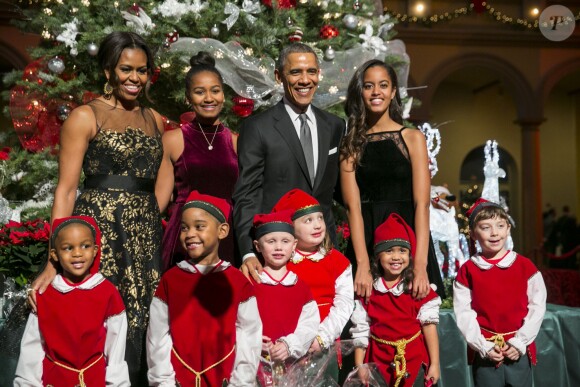 Barack Obama, Michelle Obama, Sasha et Malia, à Washington, le 14 décembre 2014