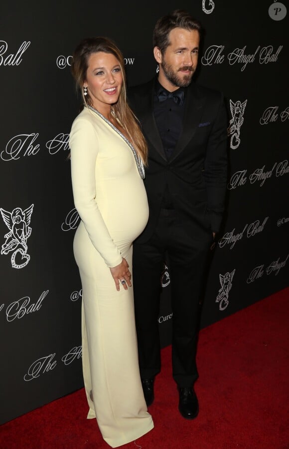 Blake Lively enceinte et son mari Ryan Reynolds à la soirée "Angel Ball 2014" à New York, le 20 octobre 2014. 