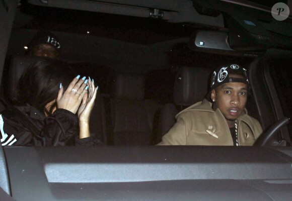 Kylie Jenner, visage caché, et le rappeur Tyga à Hollywood, le 9 janvier 2015.