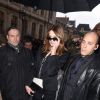Carla Bruni-Sarkozy sort du défilé de mode " Jean Paul Gaultier ", collection Haute Couture printemps-été 2015, à Paris. Le 28 janvier 2015