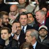 David Beckham, Sir Alex Ferguson, Youri Djorkaeff, Jamel Debbouzelors du match de ligue de champions entre le PSG et Chelsea, au Parc des Princes à Paris le 17 février 2015