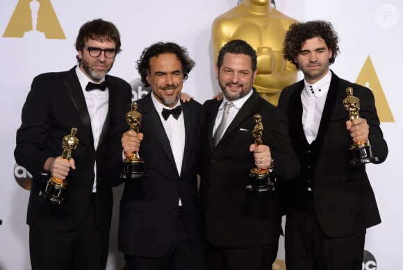 Nicolas Giacobone, Alejandro G. Inarritu, Alexander Dinelaris et Armando Bo - Press Room lors de la 87e cérémonie des Oscars à Hollywood, le 22 février 2015.