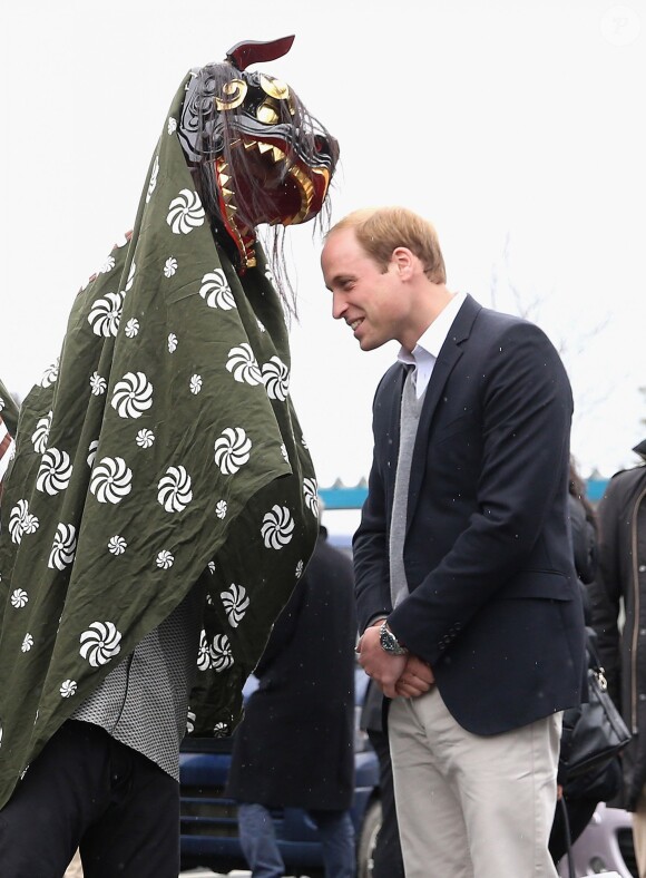 Le prince William à Ishinomaki, ville dévastée par le tsunami de 2011, le 1er mars 2015, dernière étape de sa visite officielle au Japon.