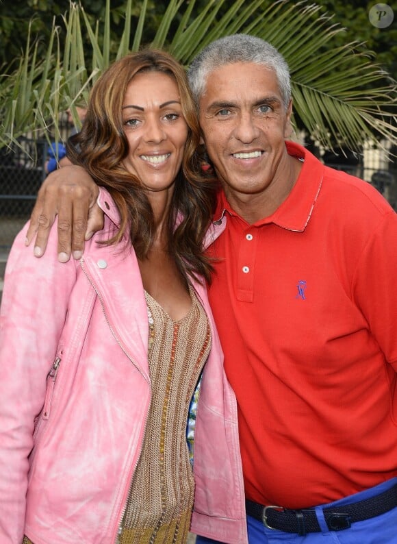 Samy Naceri avec sa dernière compagne connue Audrey lors de l'ouverture de la fête des Tuileries 2014 à Paris le 27 juin 2014