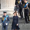 Le prince William et Kate Middleton, duchesse de Cambridge, enceinte, après avoir assisté le 13 mars 2015 en la cathédrale St Paul de Londres à un service commémorant les 453 membres des forces armées britanniques morts lors des opérations en Afghanistan depuis 2001.