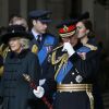 Camilla Parker Bowles et le prince Charles, suivis par le prince William et Kate Middleton, enceinte, le 13 mars 2015 en la cathédrale St Paul de Londres, avec la reine Elizabeth II et d'autres membres de la famille royale, à un service commémorant les 453 membres des forces armées britanniques morts lors des opérations en Afghanistan depuis 2001.