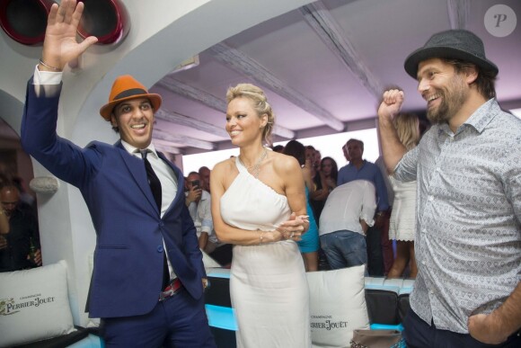 Exclusif - guest, Pamela Anderson et son mari Rick Salomon - Pamela Anderson et son mari Rick Salomon inaugurent le VIP Room Poltu Quatu à Porto Cervo en Italie le 26 juillet 2014. 