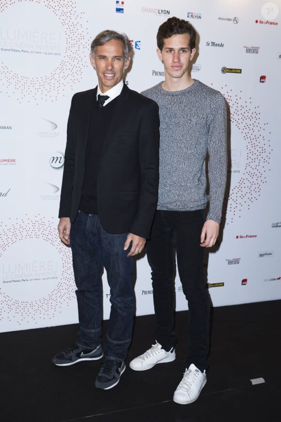 Paul et son fils Victor Belmondo - Inauguration de l'exposition "Lumière! Le cinéma inventé!" au Grand Palais à Paris, le 26 mars 2015.