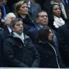 Michel Cymès et sa femme Nathalie lors du match entre la France et le Brésil au Stade de France à Saint-Denis le 26 mars 2015