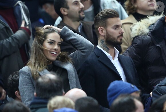 M. Pokora et sa compagne Scarlett lors du match entre la France et le Brésil au Stade de France à Saint-Denis le 26 mars 2015