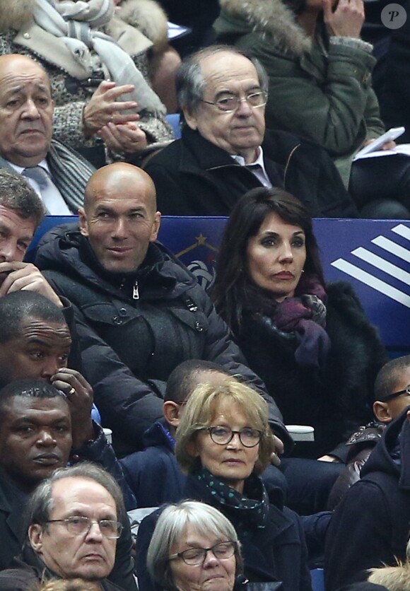 Noël Le Graët, Zinédine Zidane et sa femme Véronique lors de la rencontre entre l'équipe de France et la sélection brésilienne, au Stade de France à Paris le 26 mars 2015