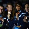 Charlotte Bonnet, Camille Muffat, Coralie Balmy et Mylène Lazare, médaillées de bronze sur le relais 4x200 m nage libre lors des championnats du monde à Barcelone, le 1er août 2013