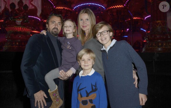 Henri Leconte, sa femme Florentine et leurs enfants Marylou, Ulysse et Jules - Le musée Grévin accueille le Père Noël Coca-Cola à l'occasion des fêtes de fin d'année a Paris, le 20 novembre 2013.