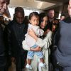Kim Kardashian, Kanye West et leur fille North arrivent à l'aéroport LAX à Los Angeles. Ils se rendent à Erevan, en Arménie. Le 7 avril 2015.