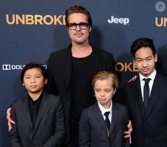 Brad Pitt, Maddox Jolie-Pitt, Pax Jolie-Pitt et Shiloh Jolie-Pitt à la première du film "Unbroken" à Hollywood, le 15 décembre 2014.