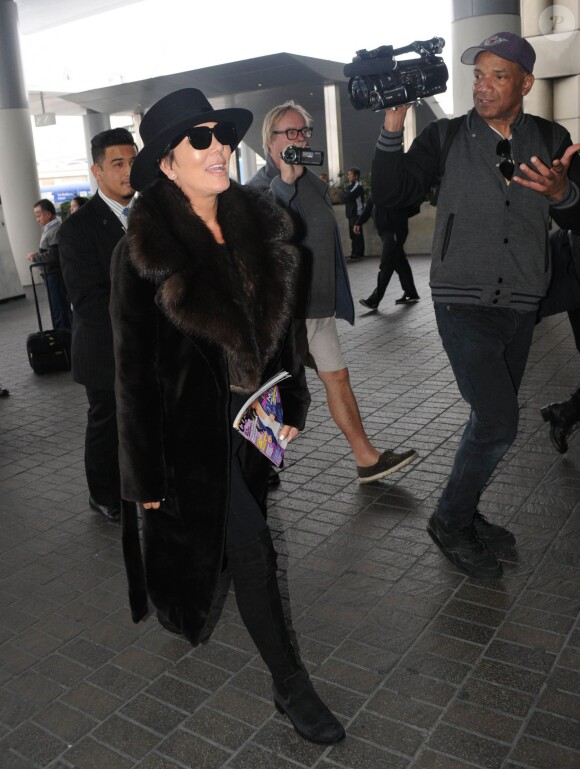 Kris Jenner prend un vol à l'aéroport de Los Angeles, le 20 janvier 2015.  
