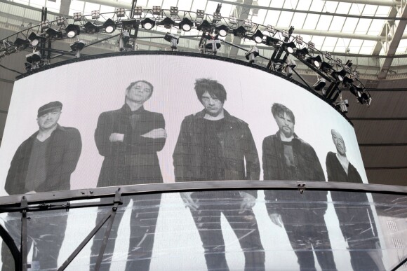 Nicola Sirkis et son groupe Indochine en concert au Stade France à Paris le 27 juin 2014.