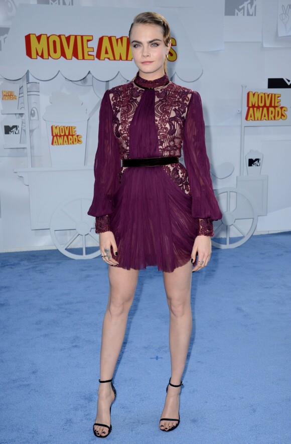 Cara Delevingne (tenue Reem Acra) lors des MTV Movie Awards à Los Angeles le 12 avril 2015