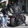 Exclusif - Johnny Hallyday fait un tour en moto avec un ami, à Malibu le 12 avril 2015.