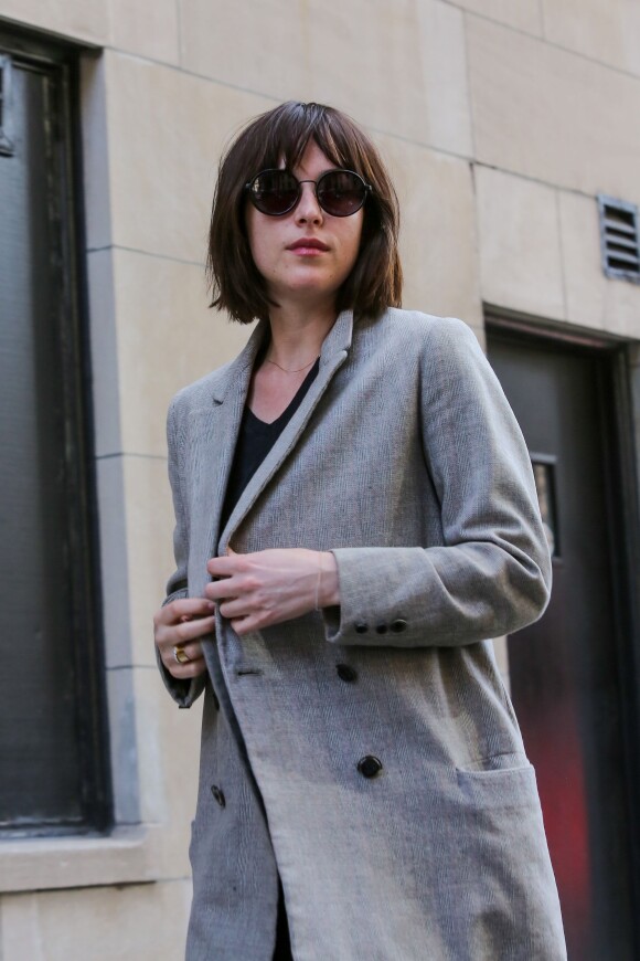Fifty Shades of Grey starlet Dakota Johnson exited a spa in the Big Apple on Wednesday debuting her brand new short do in New York City, NY, USA on April 15, 2015. The 25-year-old beauty swept her cropped hair into a trendy half-up half-down style keeping the rest of her look simple in a taupe coat black skinnies and loafers. Photo by GSI/ABACAPRESS.COM16/04/2015 - New York City