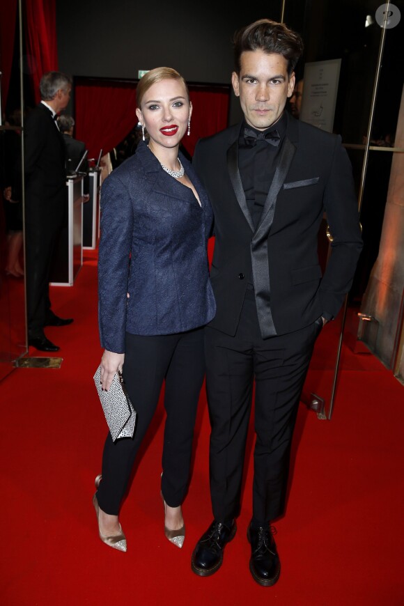 Scarlett Johansson et Romain Dauriac à la 39e cérémonie des César au théâtre du Châtelet à Paris, le 28 février 2014.